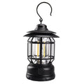 Portable camping lantern in dark green, black, or red colours, showing compact size with battery compartment.