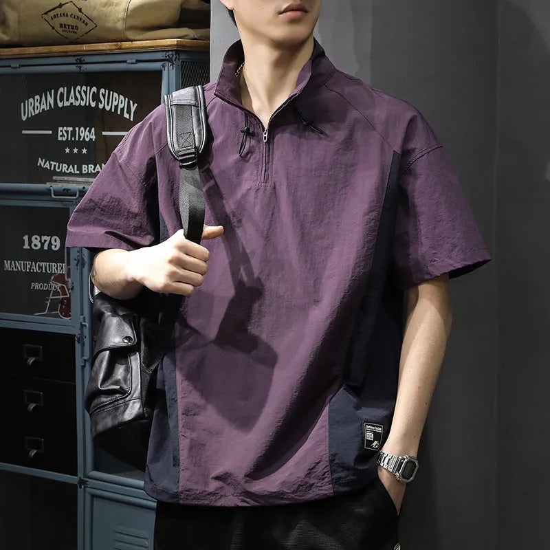 Brown men's half-zipped stand collar short-sleeved shirt on a hanger, showing fleece lining.
