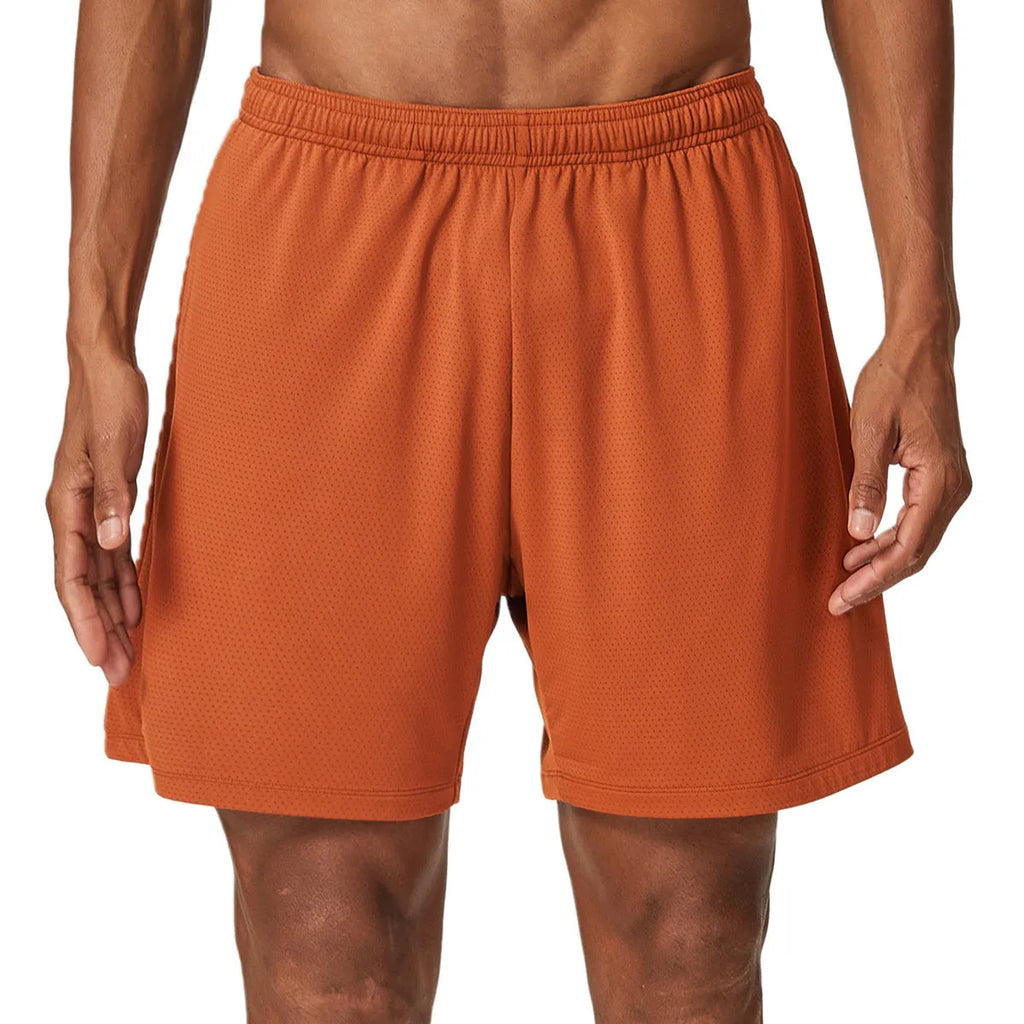 Man wearing sky green quick-drying double-layer running shorts for exercise.