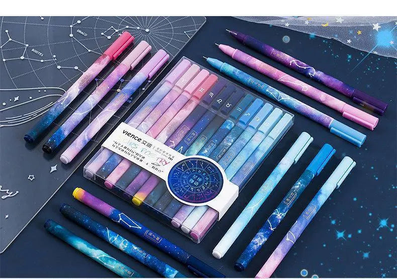Twelve zodiac constellation ballpoint pens in assorted colours with plastic barrels and star motifs