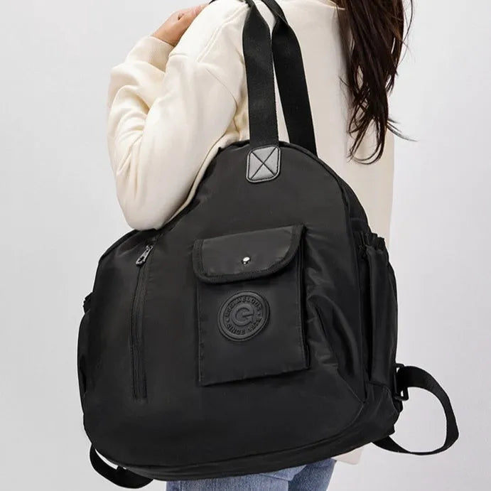 Nylon women's backpack in black, khaki, or green letter rabbit, showing sandwich pocket and large 48cm height.