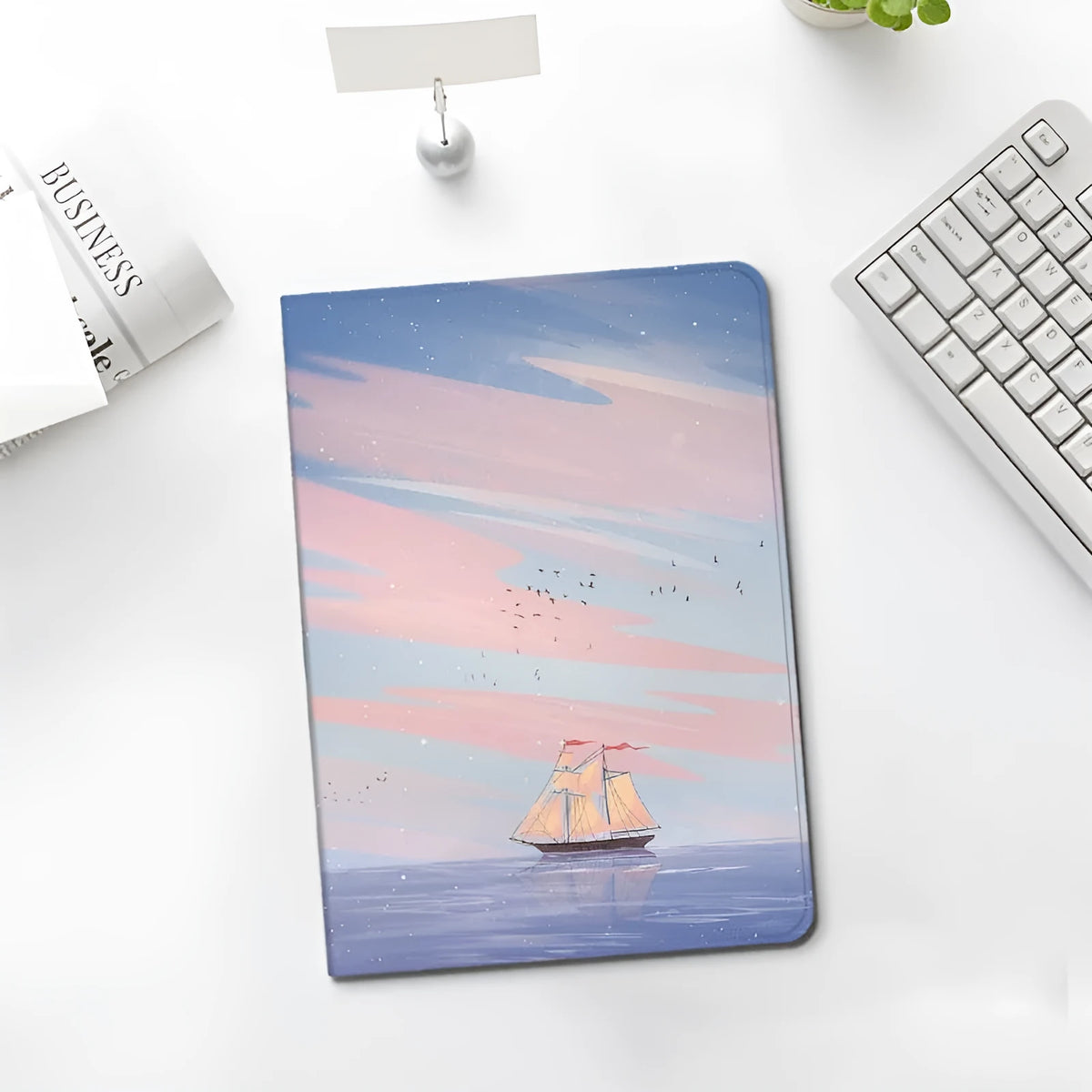 Silicone iPad cover with dreamy painting style sailing design in book style