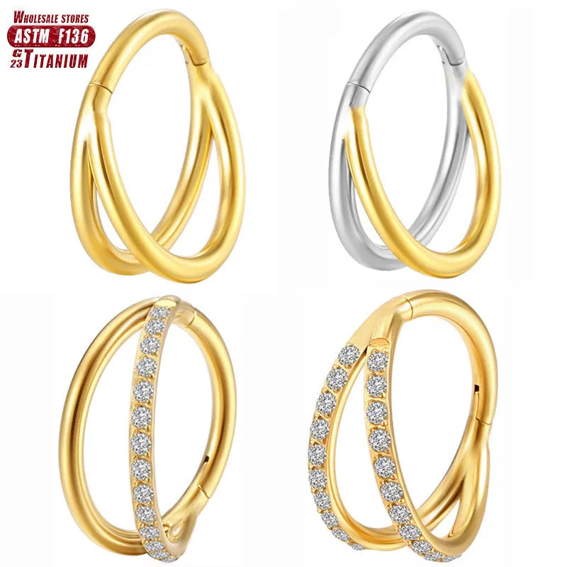 Titanium alloy nose ring body jewellery in silver colour on a plain background.