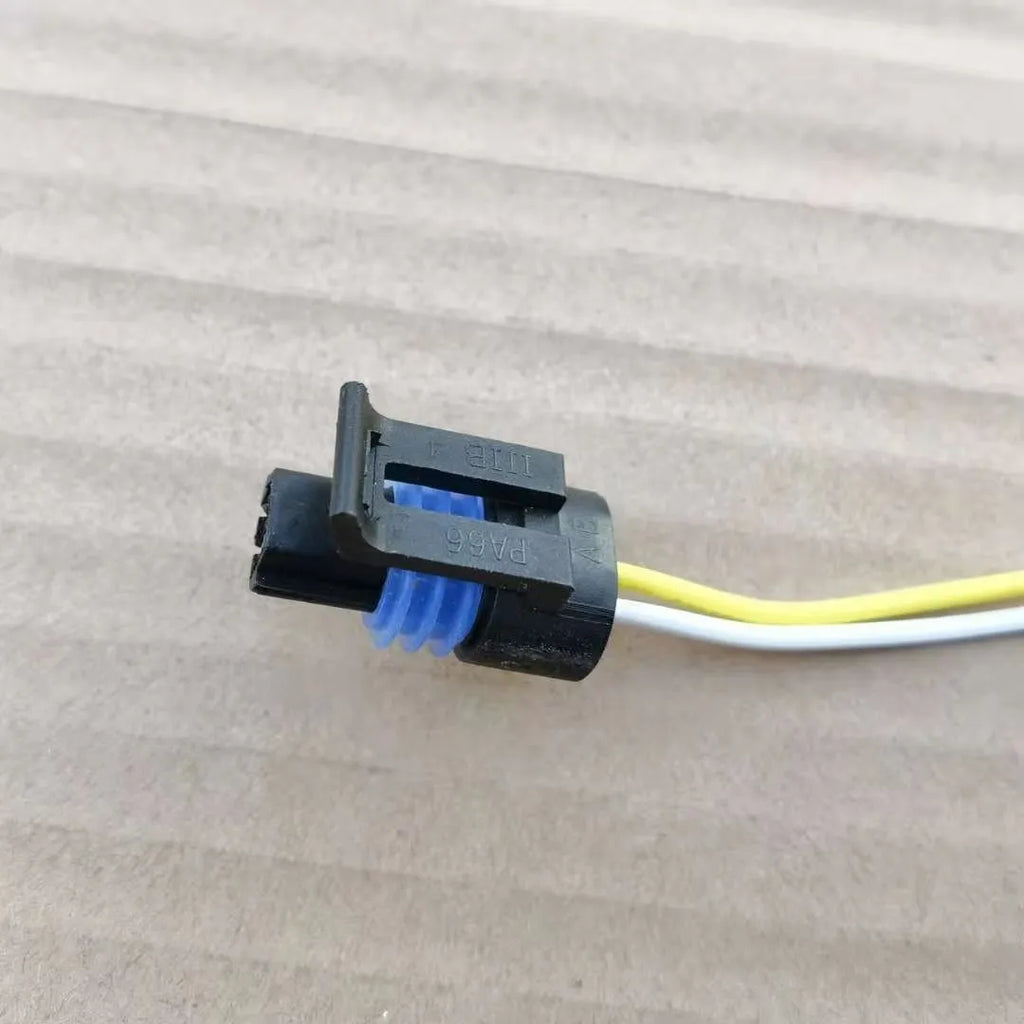 ACDelco brand water temperature sensor plug for automotive coolant system replacement.