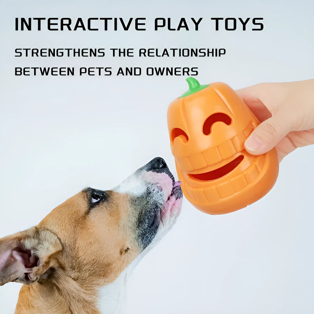 Orange Halloween pumpkin shaped interactive dog chew toy with treat-dispensing funnel