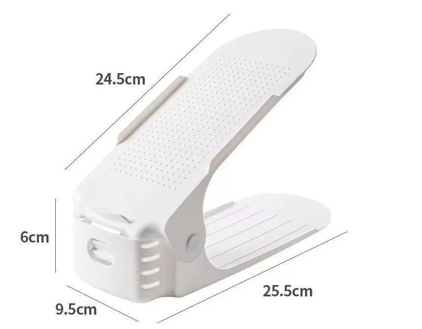 Adjustable double-layer thickened plastic shoe rack in black, folded flat for compact storage