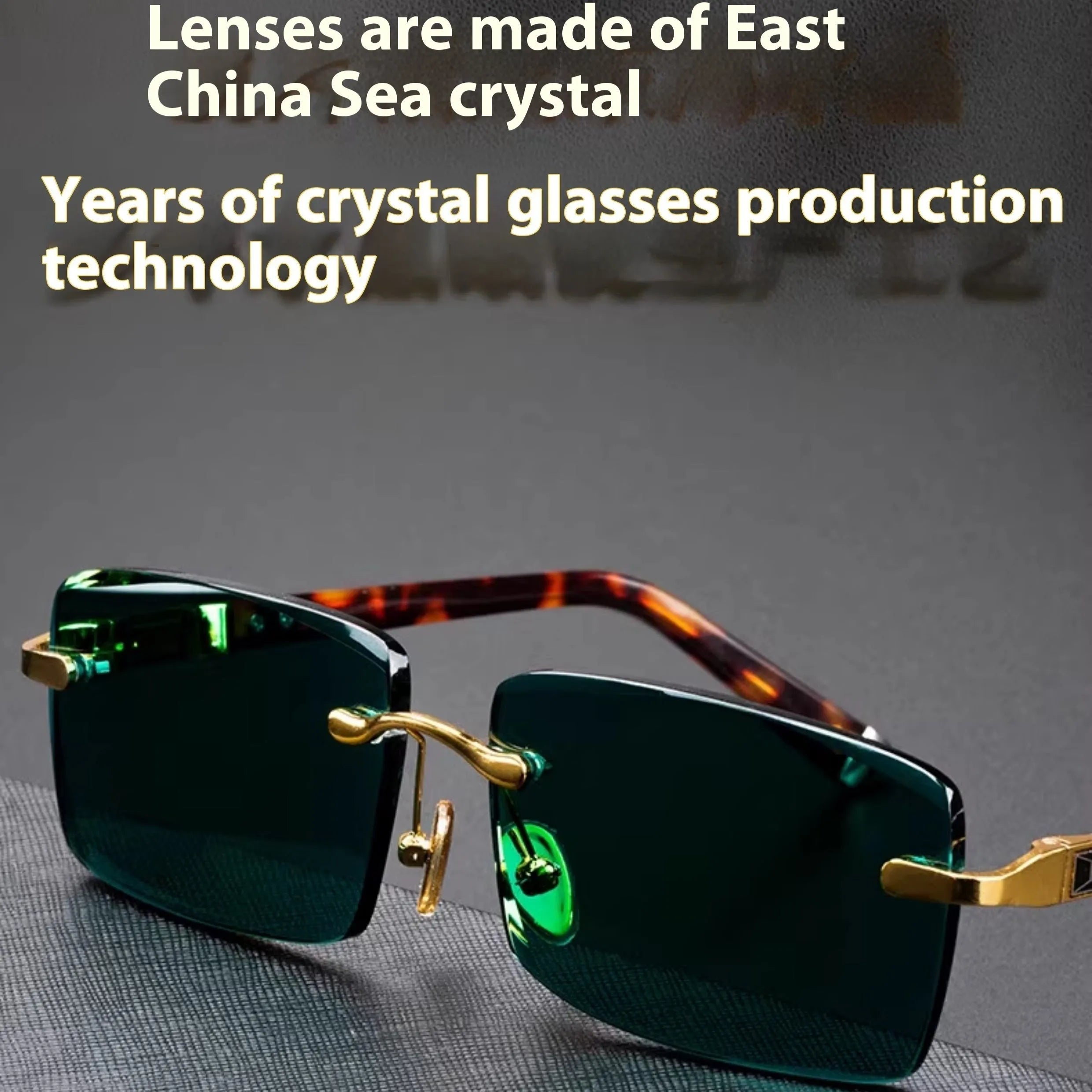 Frameless sunglasses with dark green crystal lenses showing a decorative wealth attracting pattern.