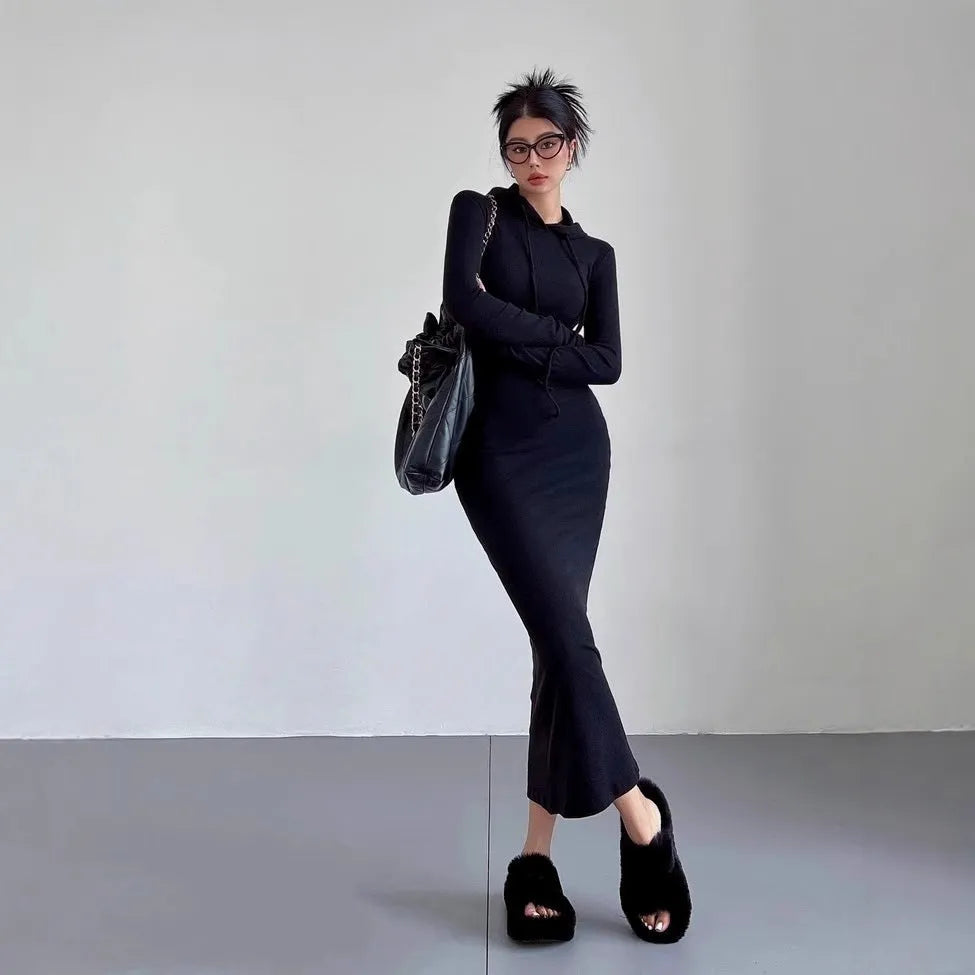Women's long sleeve hooded sheath dress in grey shown at knee length