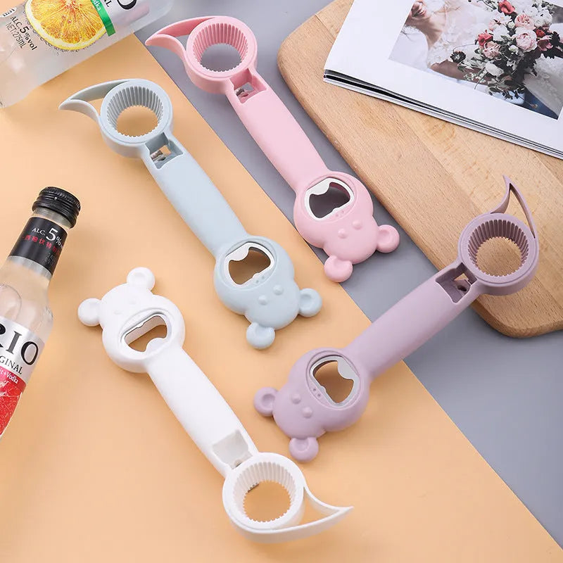 4-in-1 stainless steel and PP manual bottle opener and jar opener in gray blue, 21 cm long, on a white surface