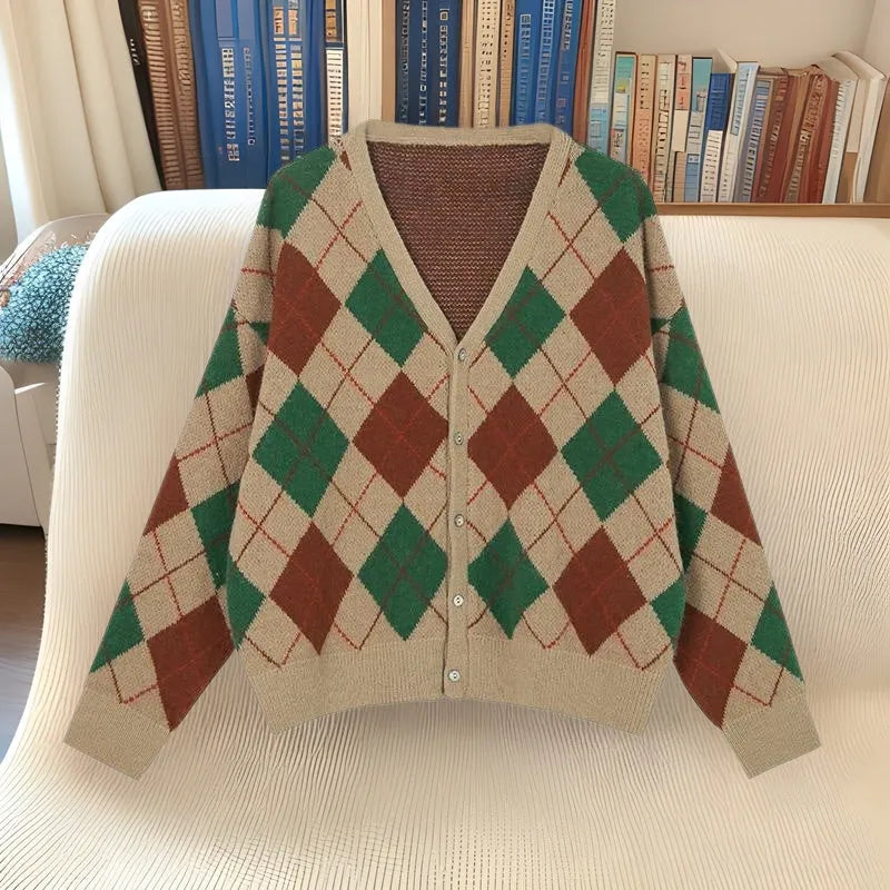 A casual knitted acrylic cardigan coat in a macaron colour, shown in a regular fit with regular sleeves.