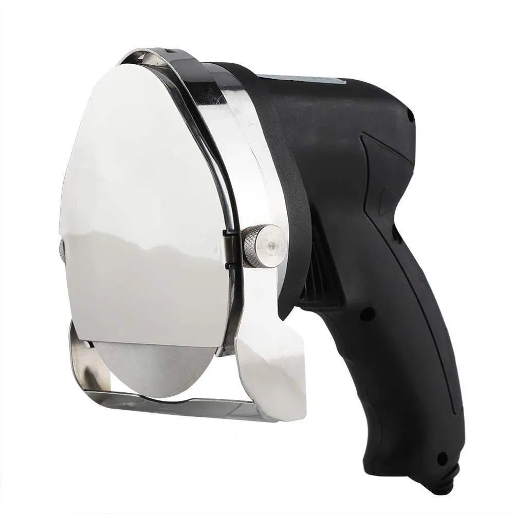 Black electric meat cleaver with power cord for turkey barbecue machines on a kitchen counter