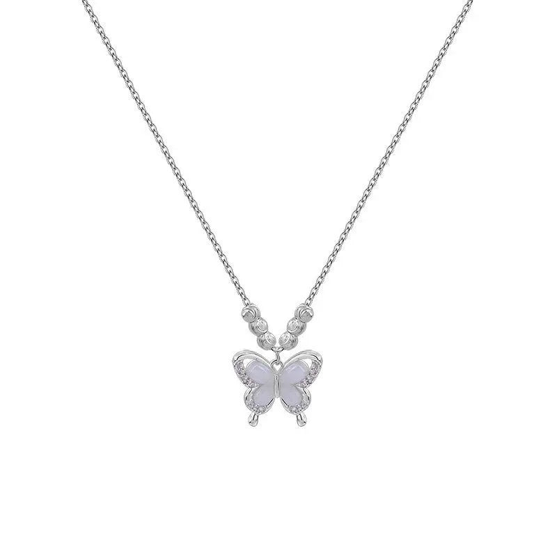 Women's silver butterfly necklace with a cross chain, showing the 925 silver pendant and adjustable length.