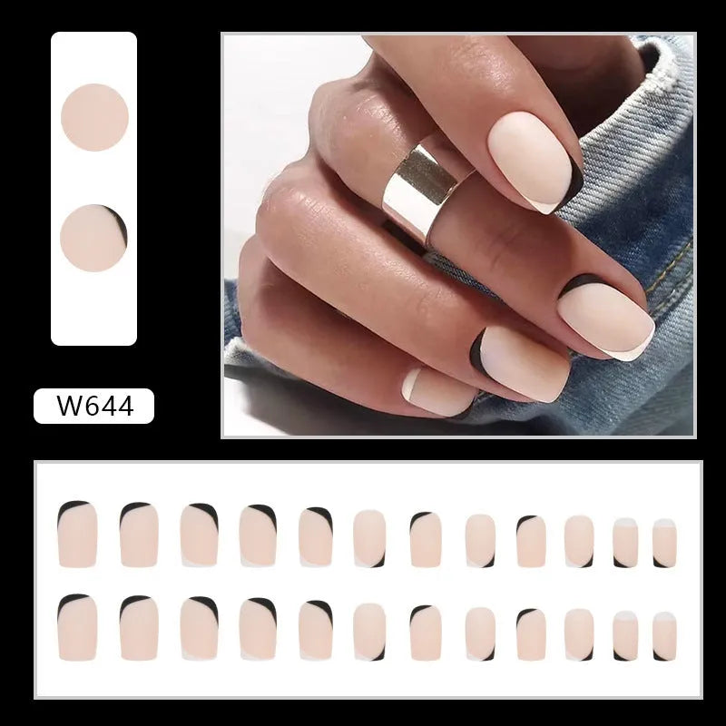 Black and white frosted false nails set with mandarin duck colour design