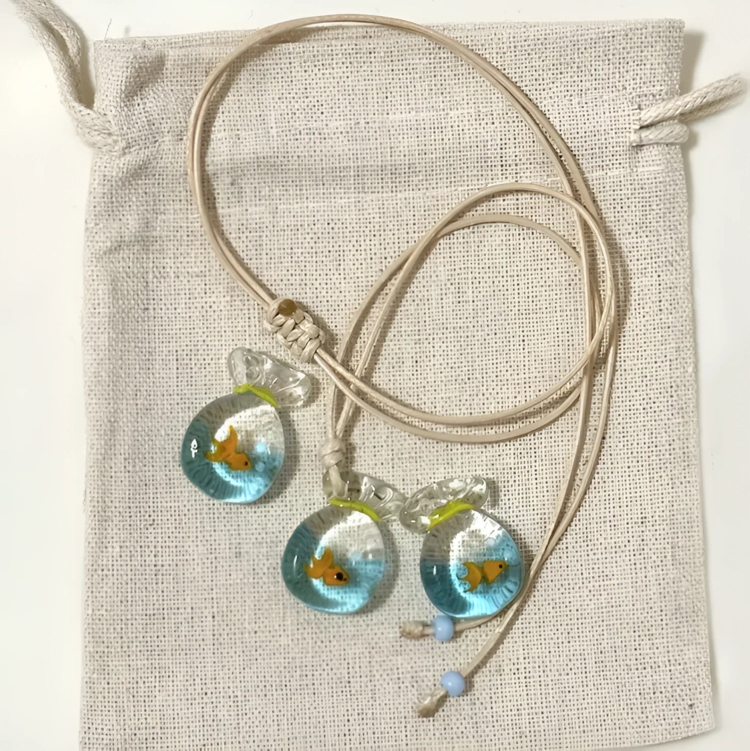 Women's necklace with a coloured glaze Skirt Everyday Joker pendant on a cotton and linen clavicle chain.