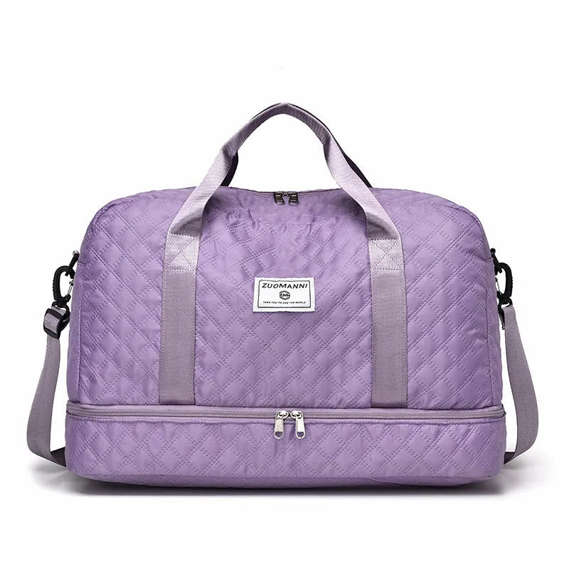Large 55-litre buggy style travel bag in Oxford cloth, shown in a solid colour with shoulder straps.