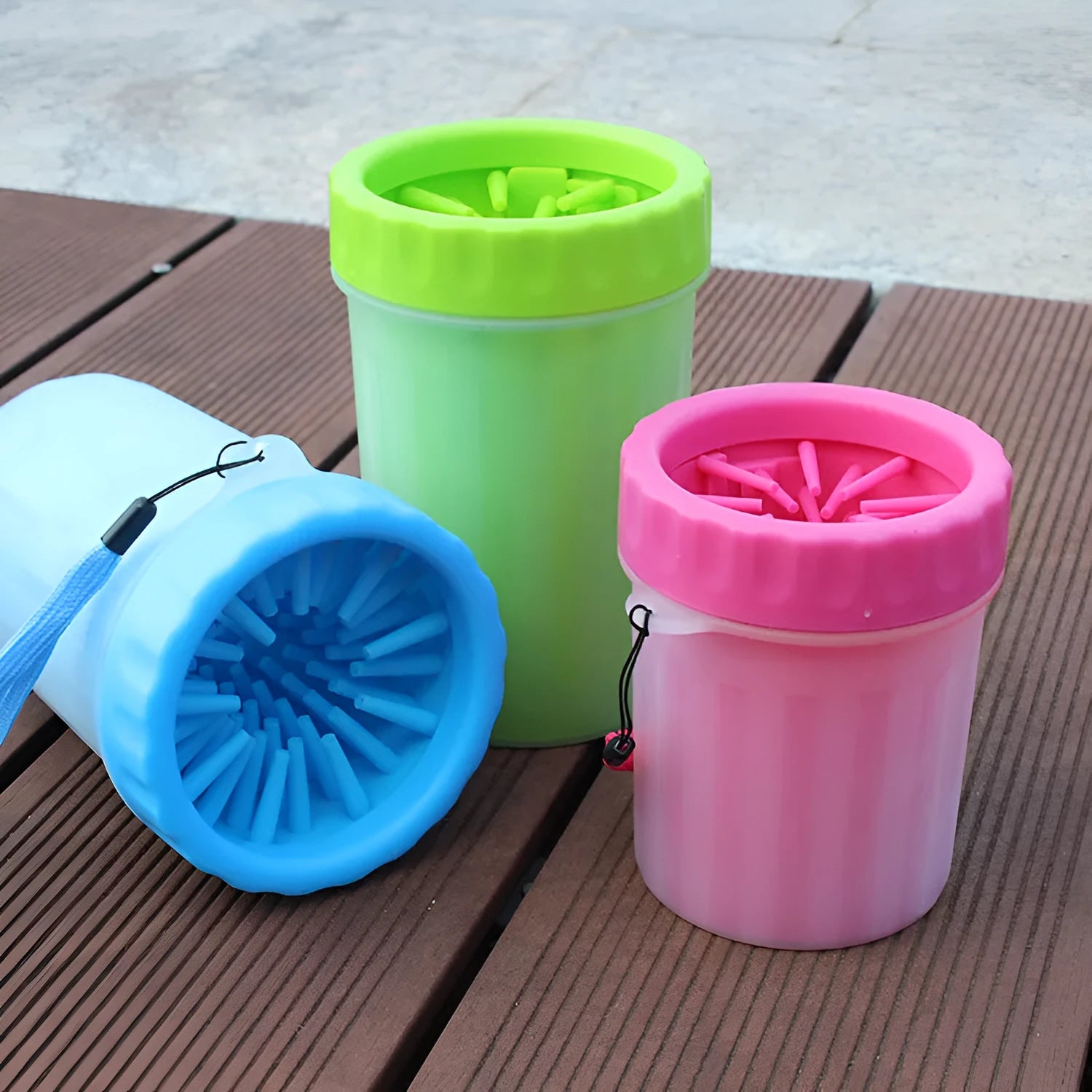 Blue silicone and plastic dog foot washing barrel with drainage hole for muddy paws