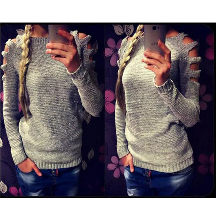 Women's grey crocheted hollow-out long-sleeve pullover shirt laid flat.