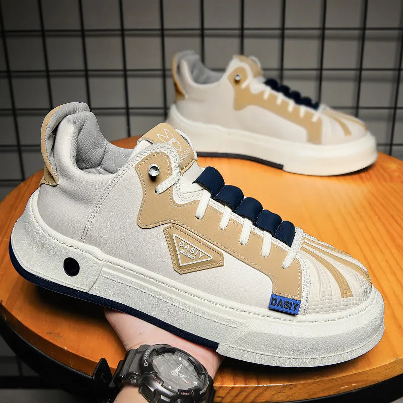 Men's beige low-top slip-on sneakers with elastic band and round toe on a plain background.