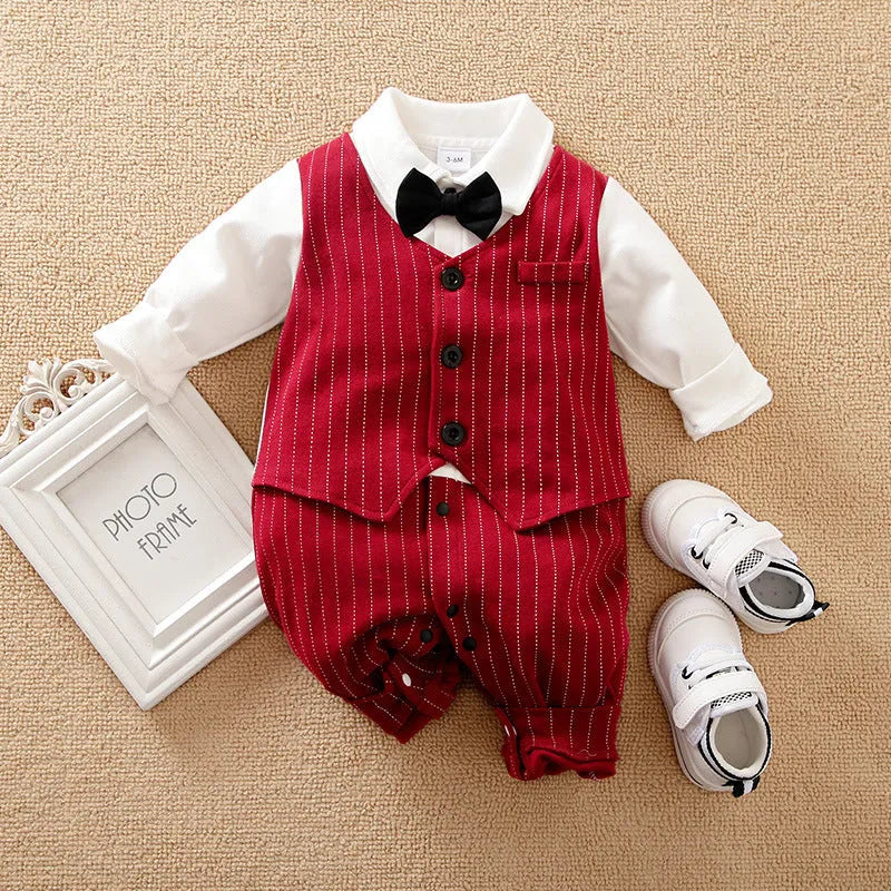 Baby boy wearing a wine red gentleman-style cotton jumpsuit with long sleeves and a single-breasted front.