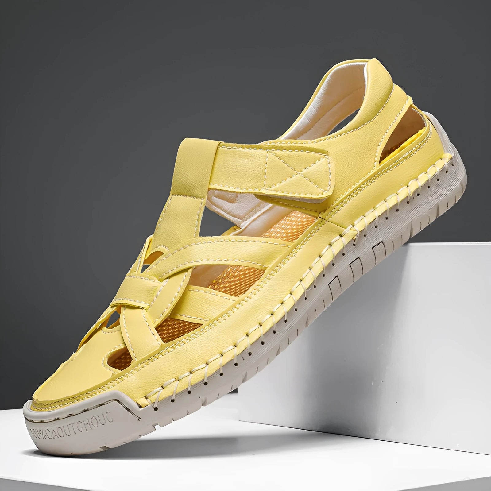 Women's low-top casual sandals with Velcro strap and round toe in microfiber, showing non-slip rubber sole.