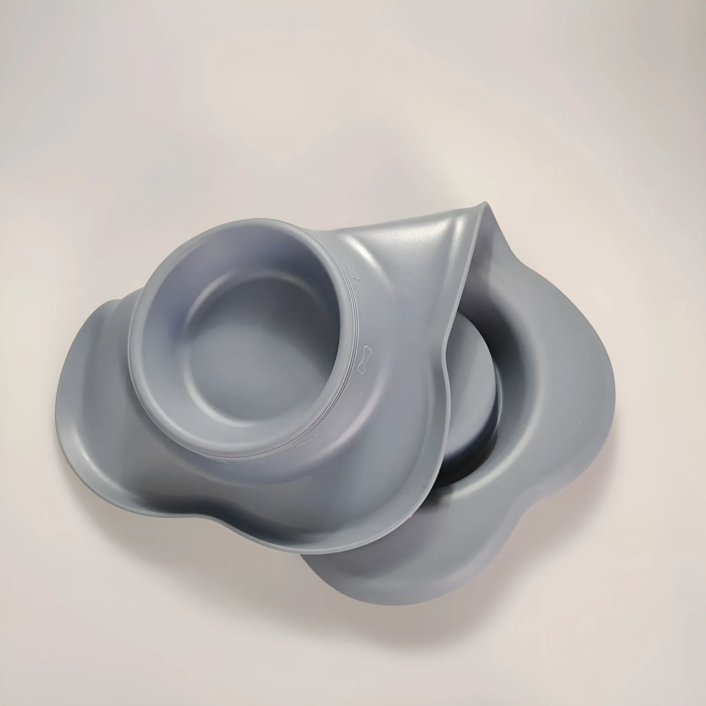Silicone dog bowl with stainless steel insert in double bowl design, shown in blue colour