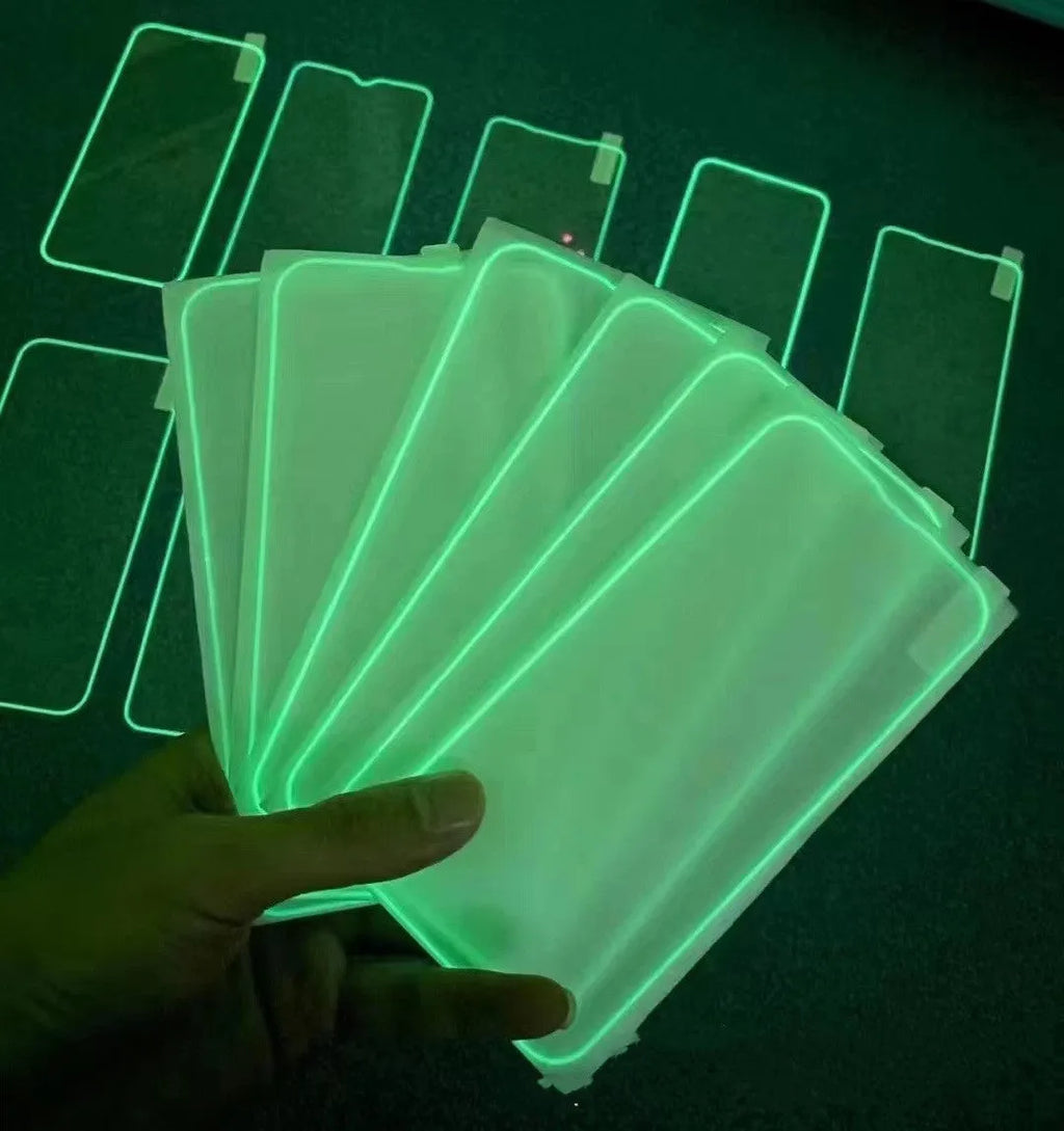 Luminous pink tempered glass screen protector fitted on an iPhone, showing full screen coverage and glow.