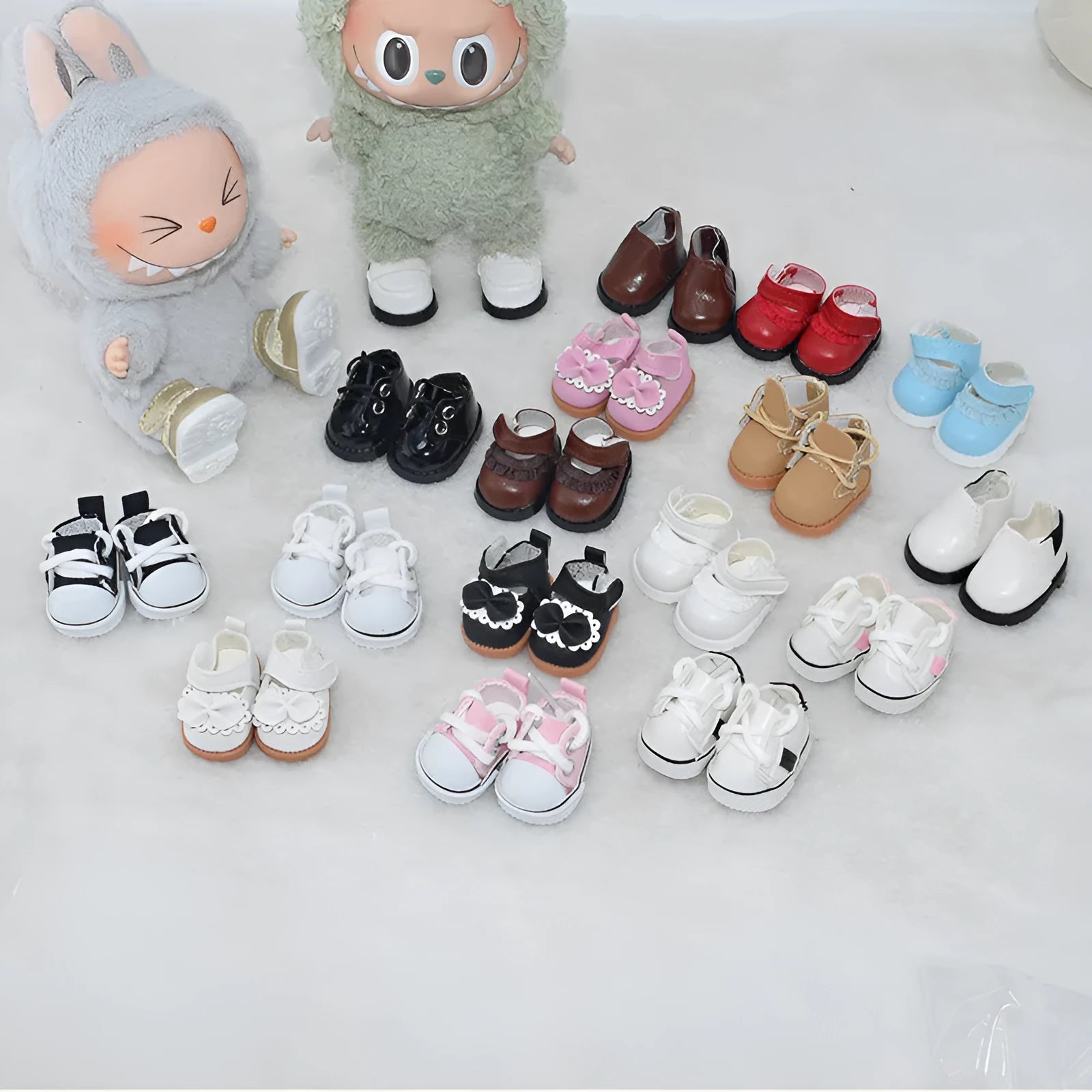 17cm high doll replacement shoes in various colours and styles on a white background.
