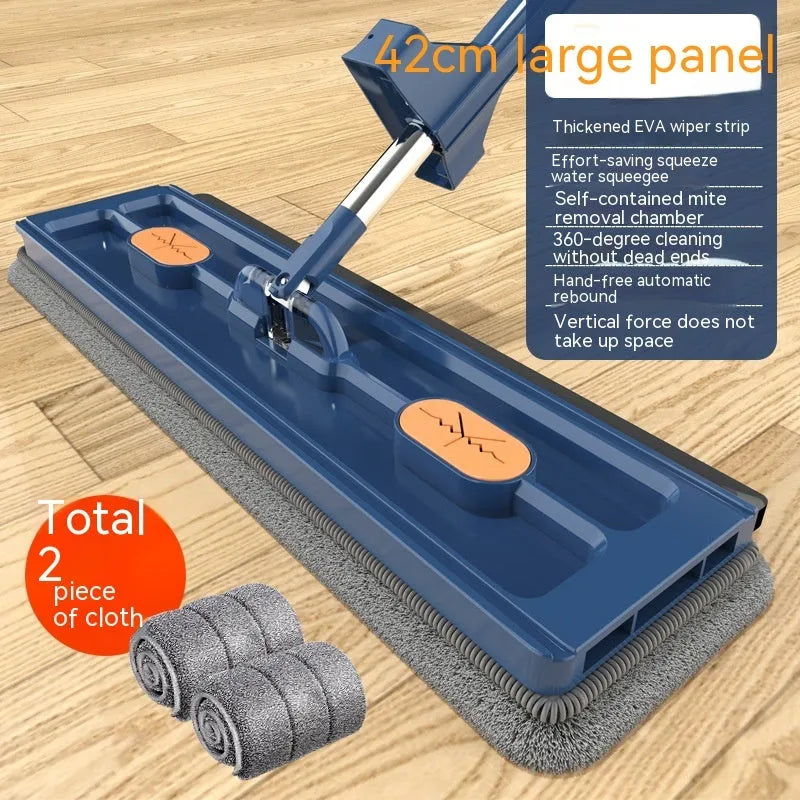 Large flat mop with long stainless steel handle and blue cleaning cloth on a hard floor