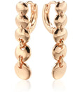 Gold-coloured retro woven round copper earrings showing textured circle design.