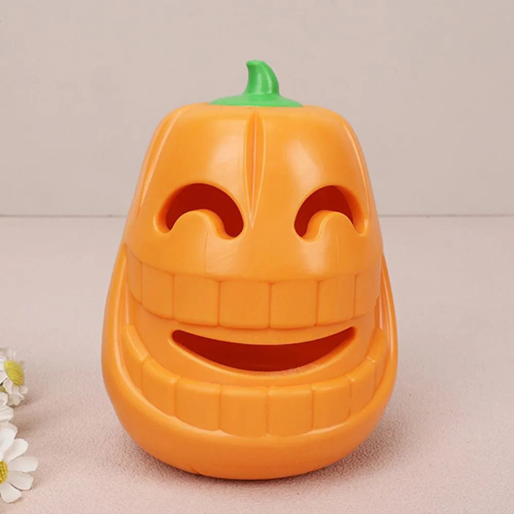 Yellow pumpkin-shaped TPR dog chew toy measuring approximately 8.6x11.5cm