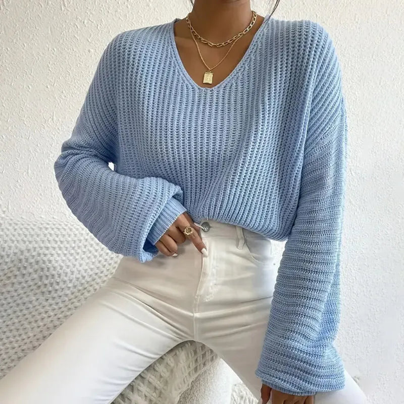 Women's solid colour long sleeve pullover top in a loose casual fit.
