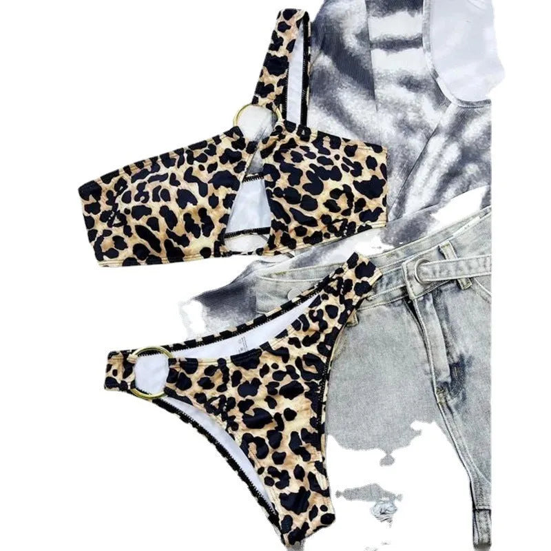 Women's leopard print polka dot bikini top and shorts on a mannequin.
