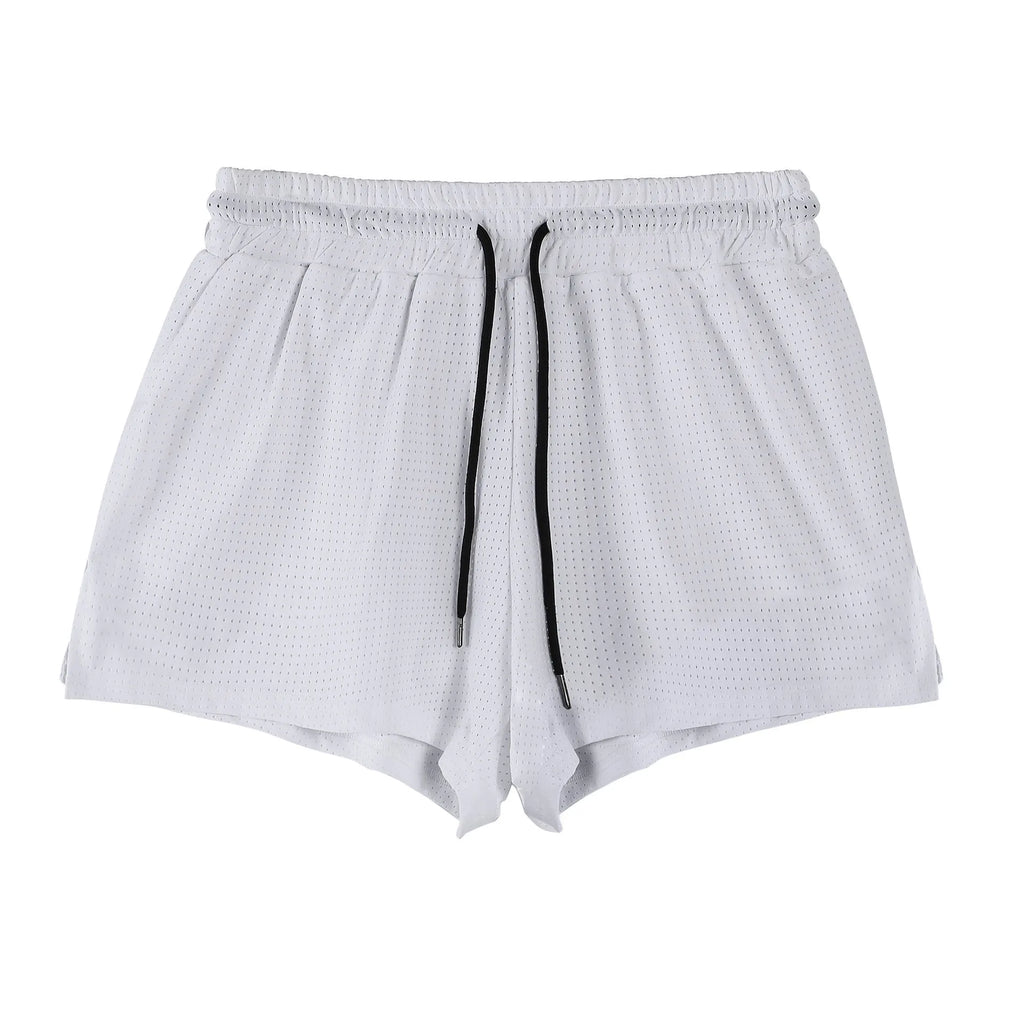 A pair of men's nylon summer shorts in black, showing the mid-waist design and short length for sports.