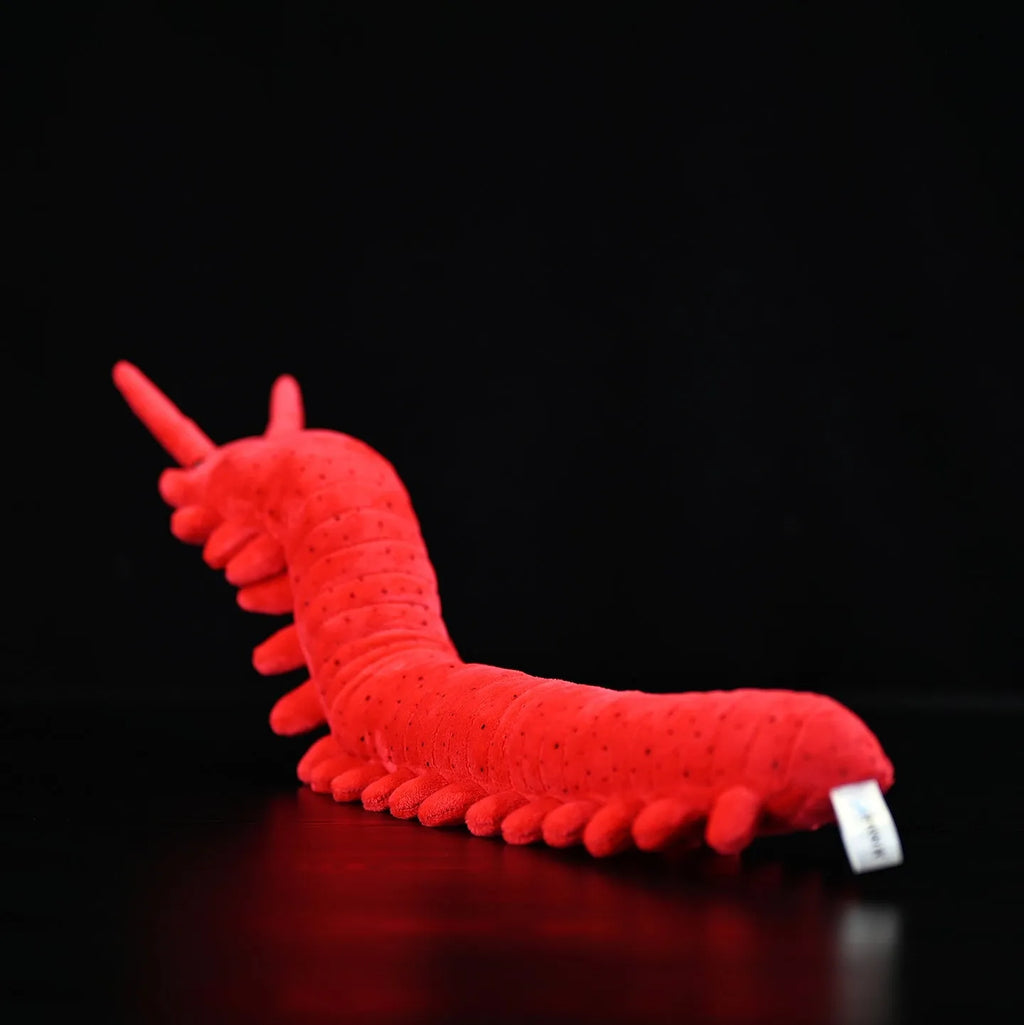 Red velvet worm plush toy silkworm doll 60cm long on a plain background