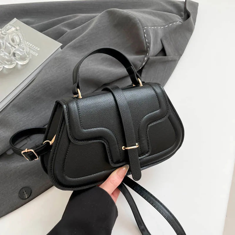 Simple PU shoulder bag in black, white or red with single strap and horizontal square shape.