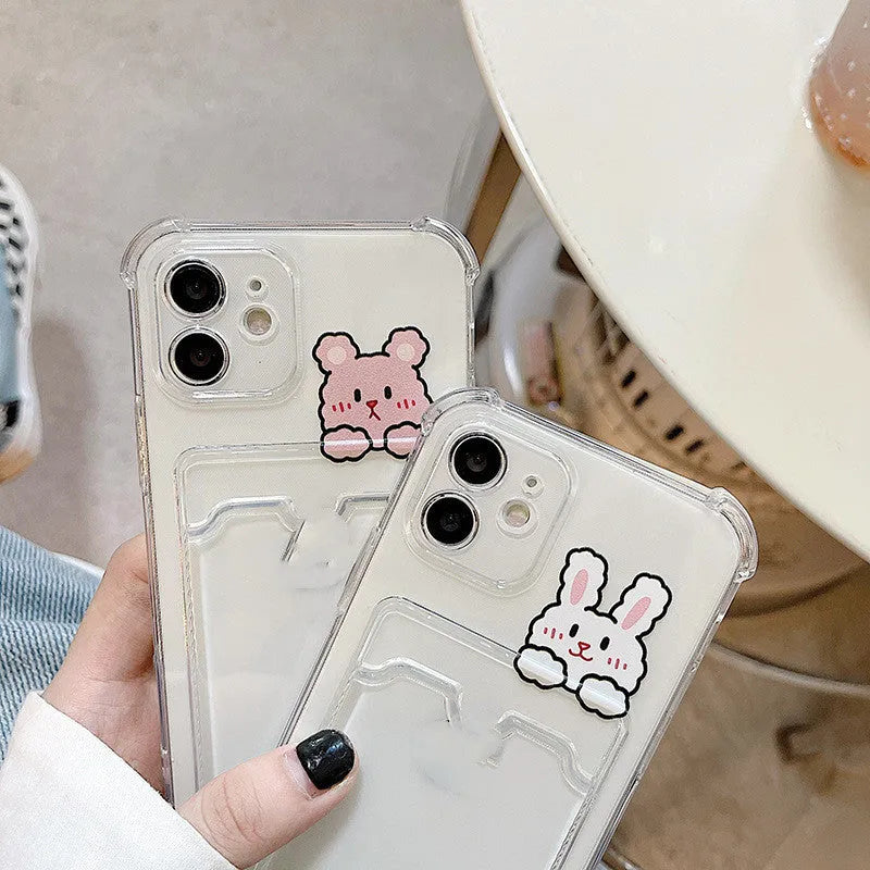 Cartoon design transparent iPhone case with card holder slots on the back.