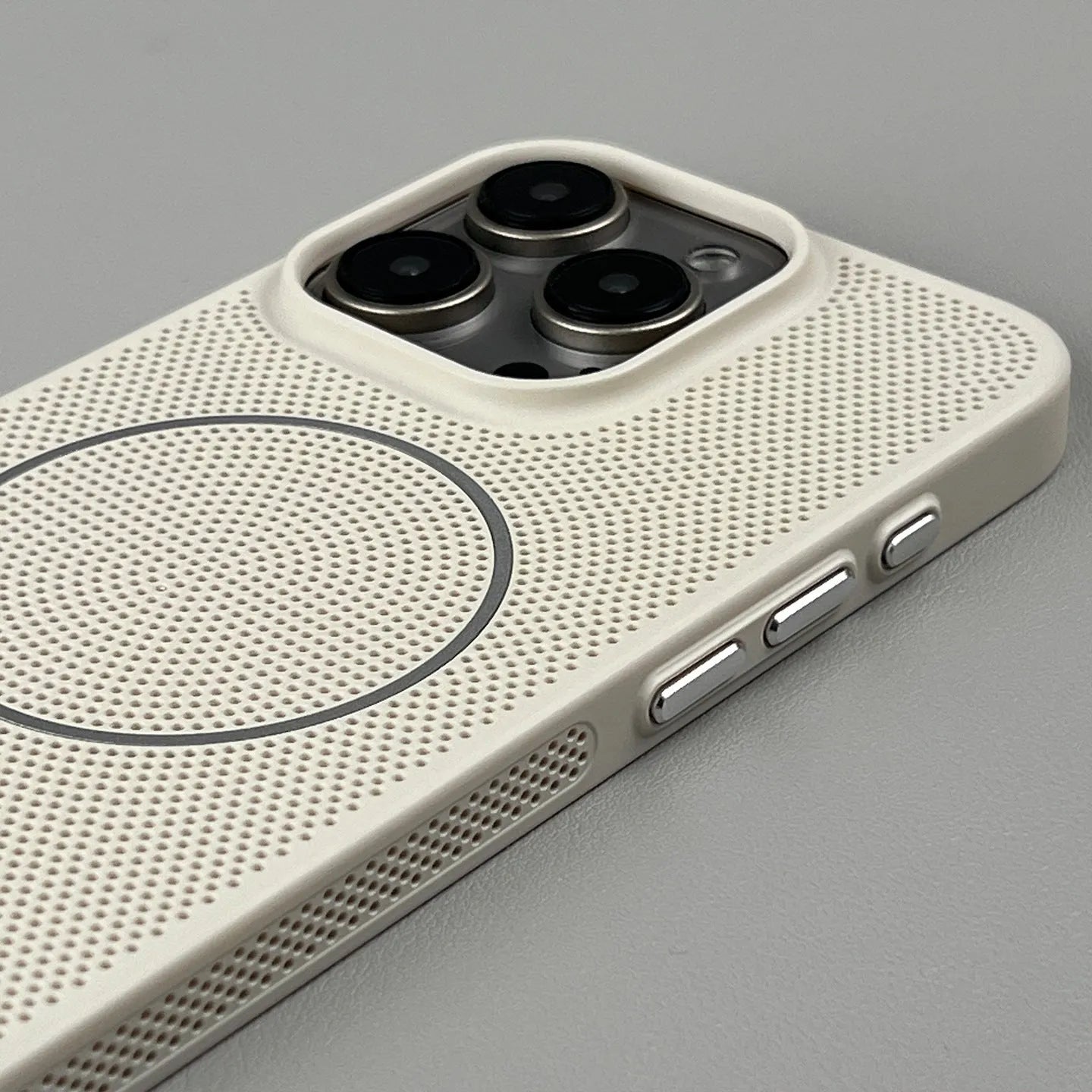 Frosted magnetic hard phone case for IPhone on a table, showing colour options.