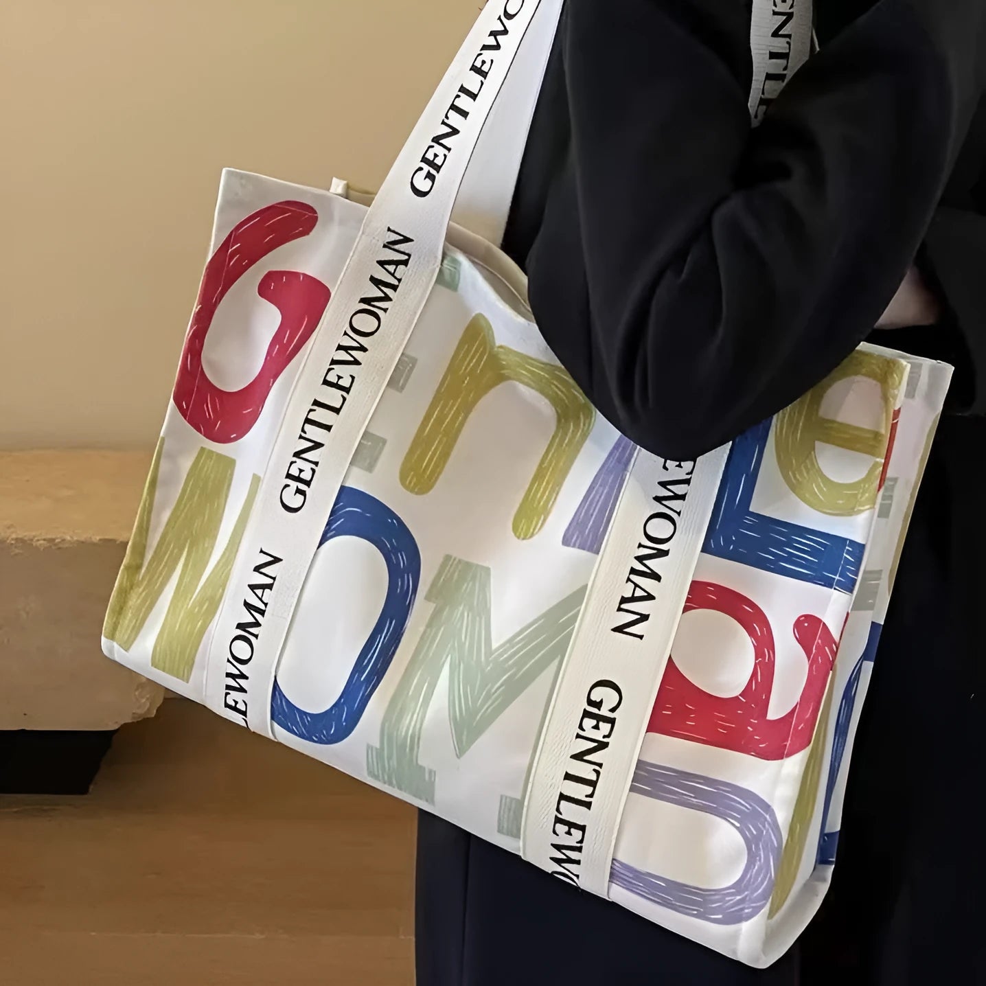 Large canvas tote bag with printed design, showing substantial capacity and casual styling