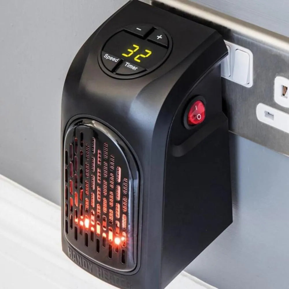 Black compact ceramic fan heater with control buttons on a white background.