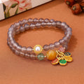 Natural gray agate bracelet with two-circle design on wrist