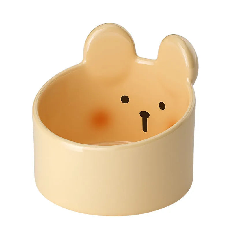 Ceramic pet feeding bowl set with neck protection design in white and brown animal patterns