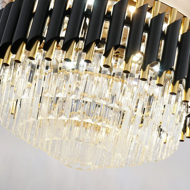 Crystal chandelier style ceiling fan with light and remote control on white ceiling.