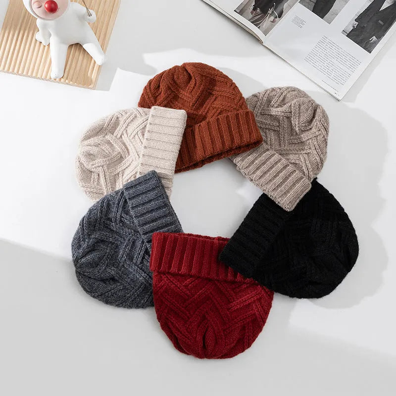 Wool knitted women's hat with dome crown in one of six colours: ivory white, khaki, red, brown, grey, or black.