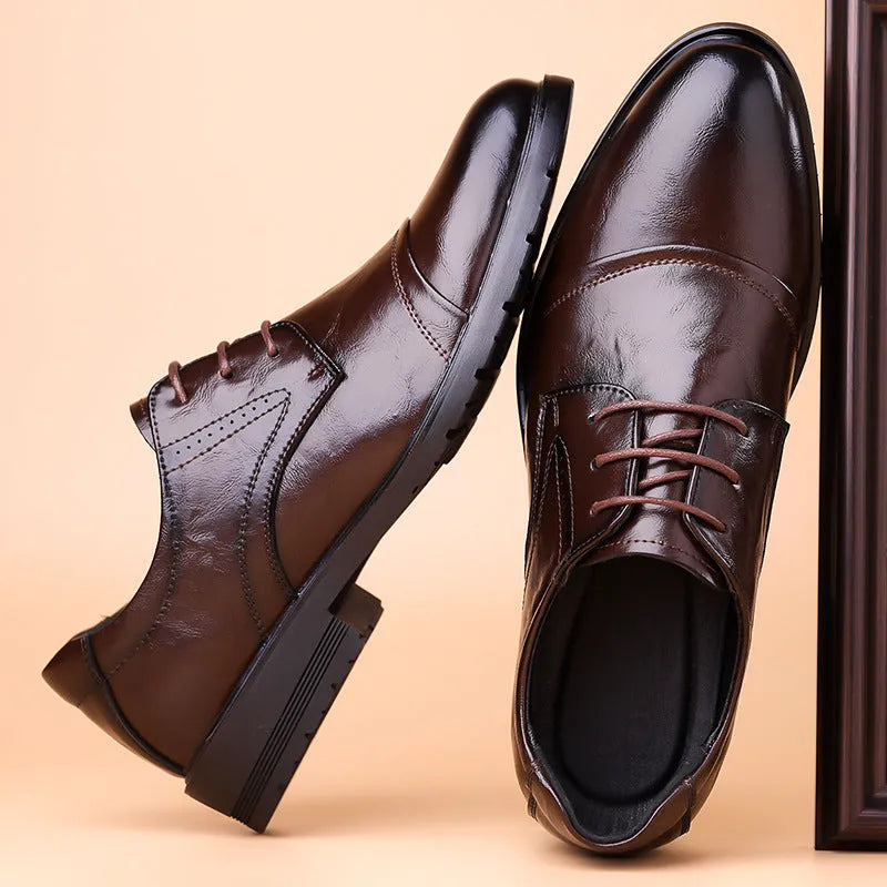 Men's business formal leather shoes in black with cow split leather upper, pointed toe, and tassel detail