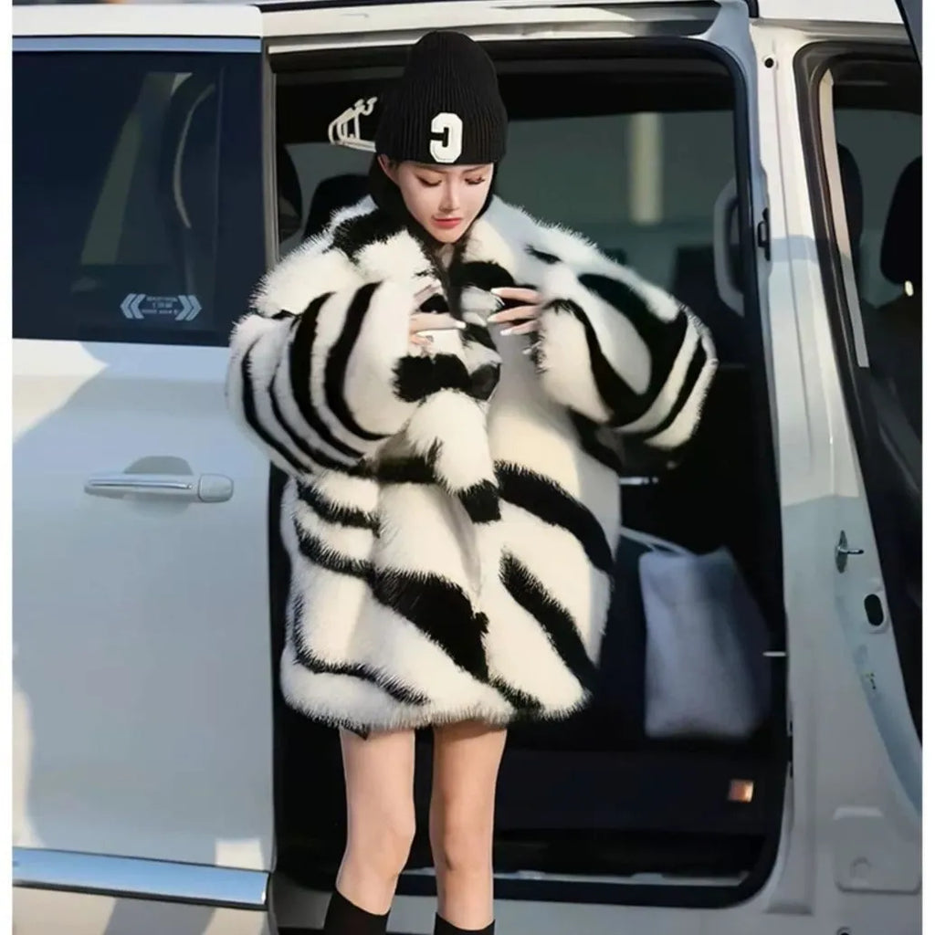 Women's zebra stripe pattern fur top with large skimmer collar and long sleeves in street fashion style