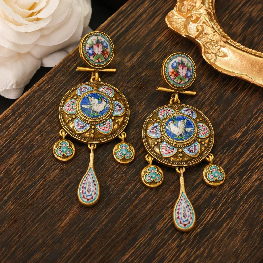Vintage court style rattle drum ear studs with peace dove design for women