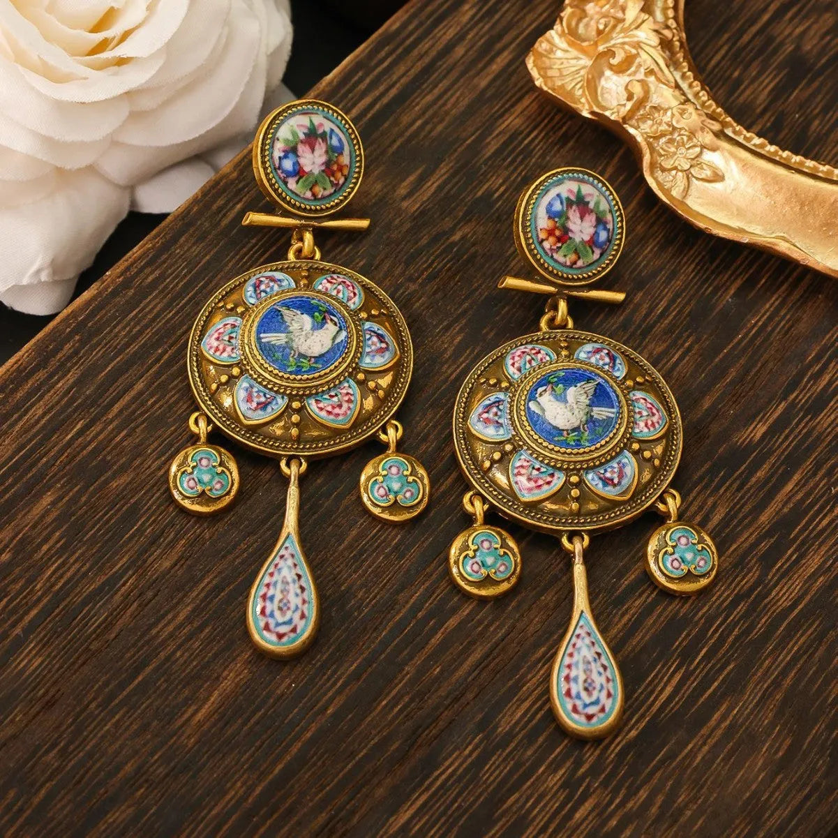 Vintage court style rattle drum ear studs with peace dove design for women
