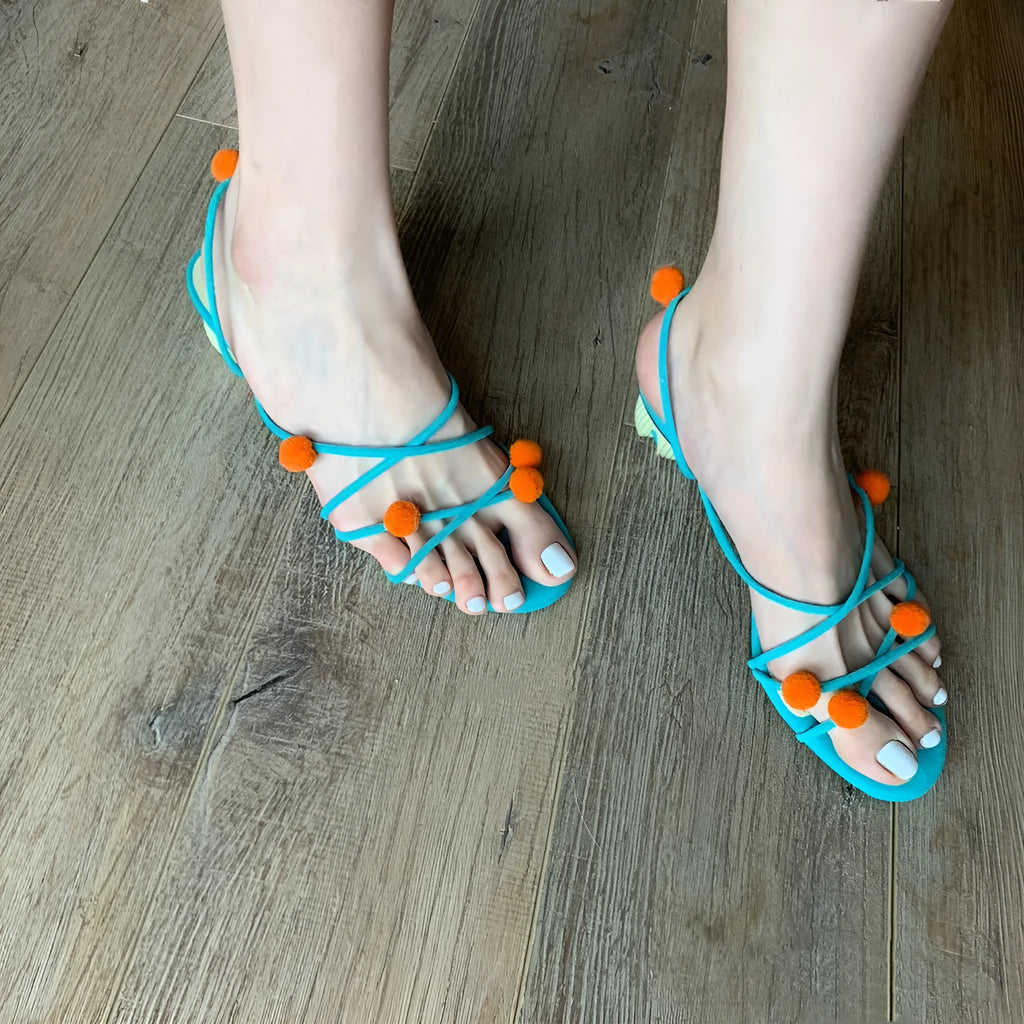 Cyan high-heeled sandals with thin strap lace-up design and open toe made from genuine French leather