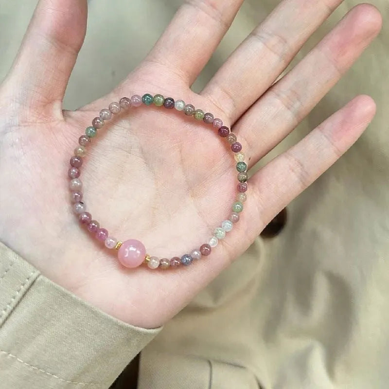 Women's pink crystal bracelet with electroplated alloy finish and geometry shape