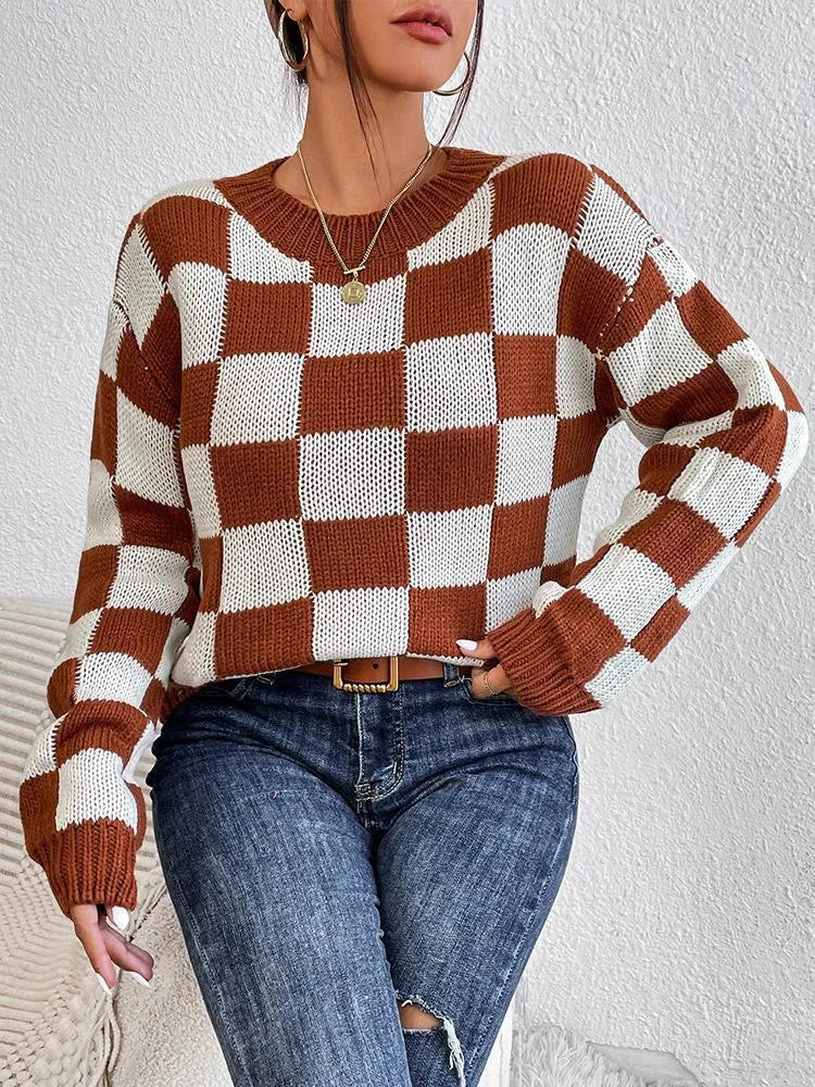 Dark brown plaid pattern on a loose-fitting acrylic pullover sweater with long sleeves